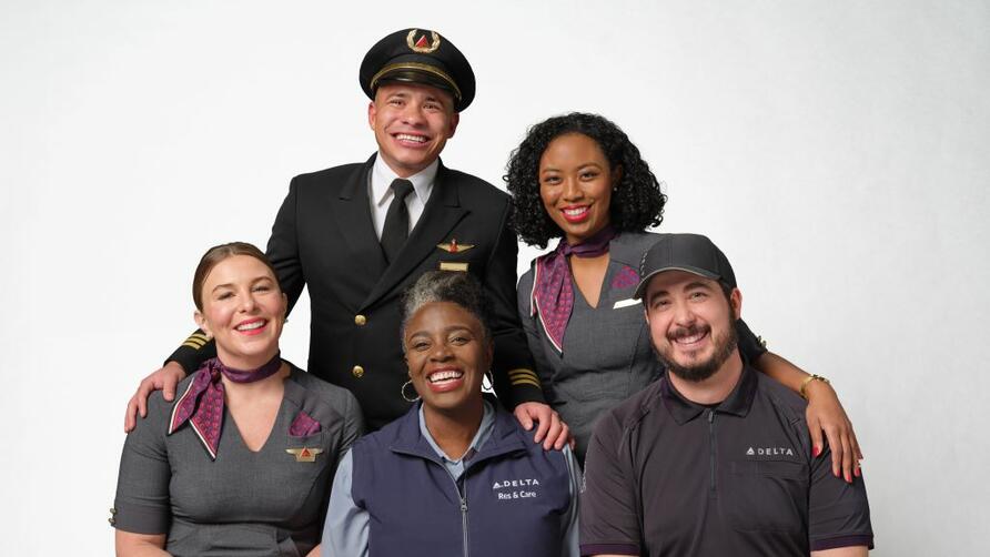 Delta employees gather for a group shot.